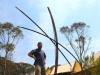 Sculptor Mark Davis with his new work